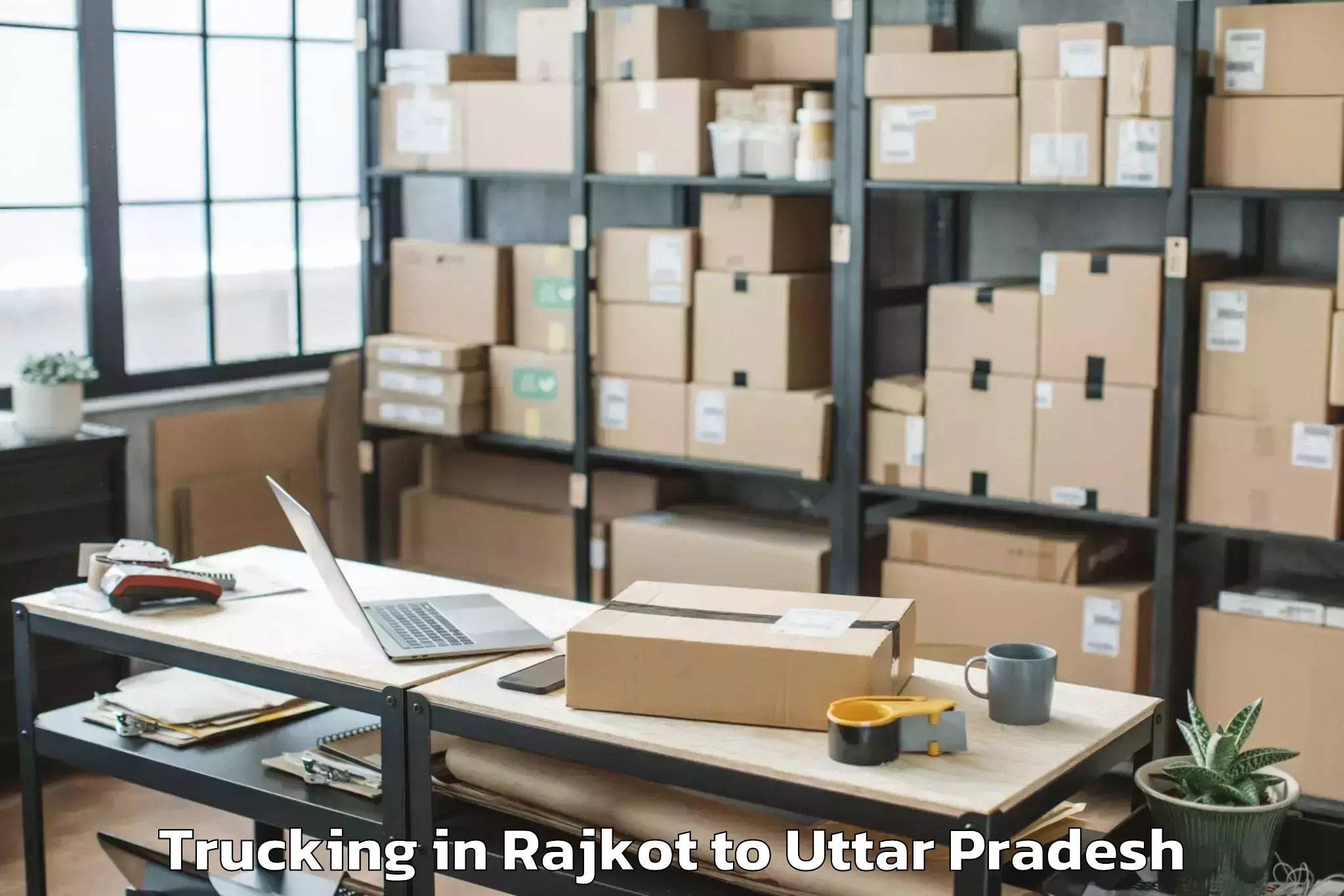 Top Rajkot to Safipur Trucking Available